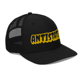 Creepy black/gold trucker hat