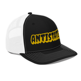 Creepy black/gold trucker hat