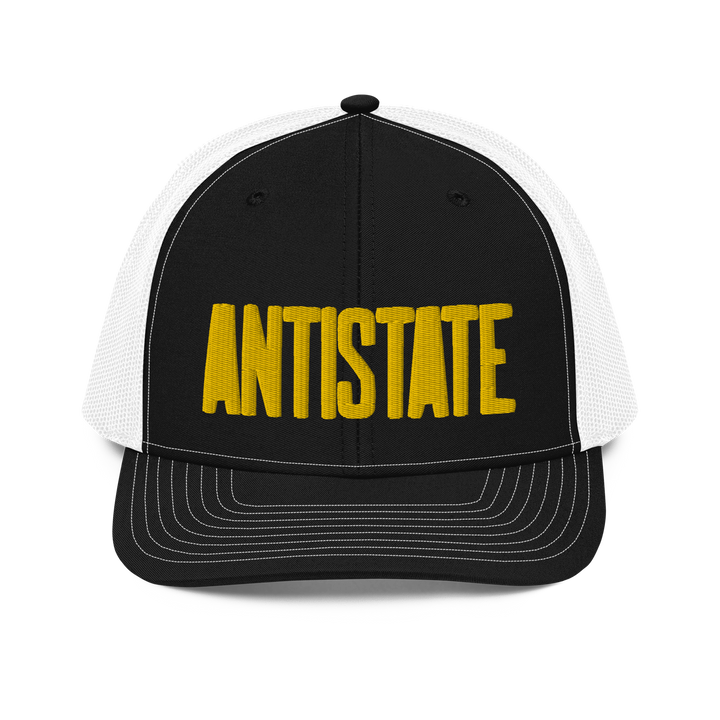 Stone black/gold trucker hat